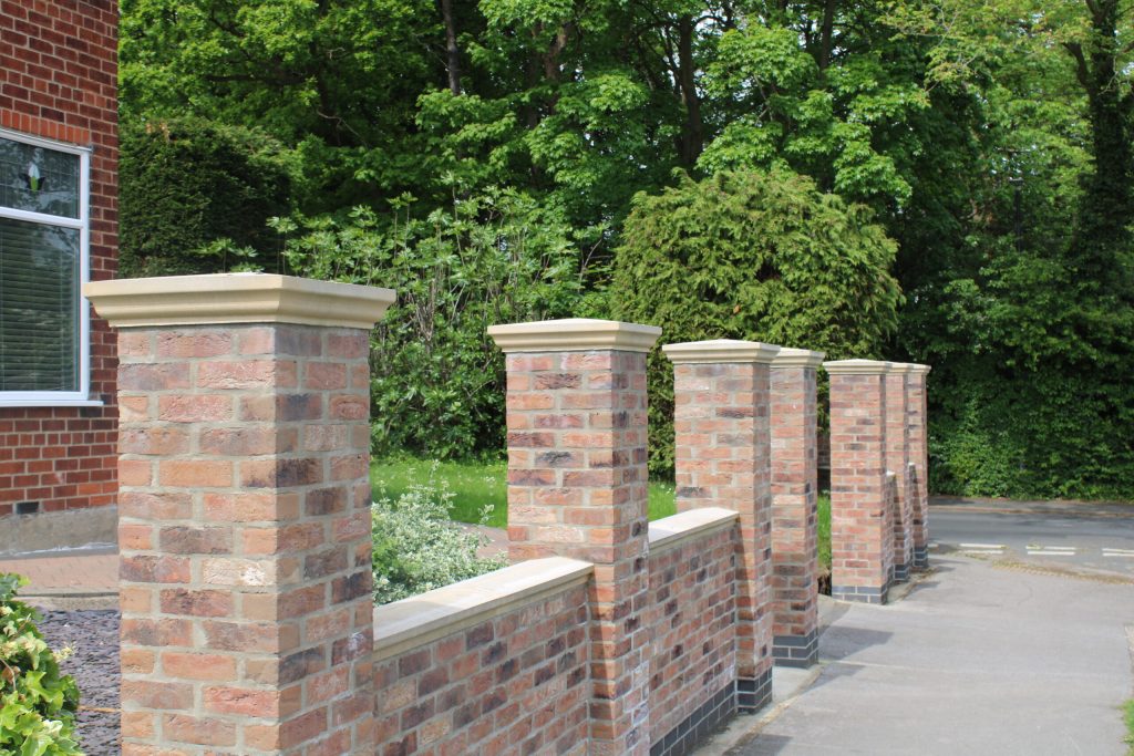 Buff Cast Stone Fluted Pier Caps, Buff Cast Stone Fluted Wall Copings, Brick Wall with a Enhanced Curb Appeal